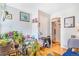 Relaxing living area with hardwood floors, bright natural light, and lots of plants at 5085 E Missouri Ave, Denver, CO 80246