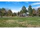 Well-maintained park playground area, perfect for Gathering fun and recreation at 5085 E Missouri Ave, Denver, CO 80246