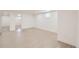 Spacious basement with bright recessed lighting, clean walls, and durable wood-look floors at 3922 W 29Th Ave, Denver, CO 80212
