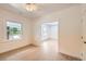 Spacious bedroom with large windows offering natural light and a view of the surrounding neighborhood at 3922 W 29Th Ave, Denver, CO 80212