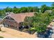 Beautiful brick building with mature trees, offering a sense of privacy and classic elegance at 3922 W 29Th Ave, Denver, CO 80212