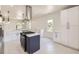 Modern kitchen featuring stainless steel appliances, white cabinets, and ample counter space at 3922 W 29Th Ave, Denver, CO 80212