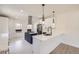 Modern kitchen features a large island, stainless steel appliances, and stylish pendant lighting at 3922 W 29Th Ave, Denver, CO 80212