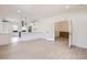 Bright and airy living room with new laminate floors and open access to the modern kitchen at 3922 W 29Th Ave, Denver, CO 80212