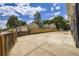 Large parking area surrounded by fences, backyard and building in a residential neighborhood at 3922 W 29Th Ave, Denver, CO 80212