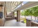 Inviting front porch with brick columns, covered area, and steps leading to the street at 3922 W 29Th Ave, Denver, CO 80212