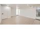 Basement room with bright recessed lighting, clean white walls, and durable wood-look floors at 3922 W 29Th Ave, Denver, CO 80212