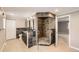 Bathroom featuring a tiled shower, double vanity, and earth-toned finishes at 6259 S Fenton Ct, Littleton, CO 80123