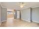 Spacious bedroom with hardwood floors and a ceiling fan at 6259 S Fenton Ct, Littleton, CO 80123