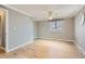 Neutral bedroom with hardwood floors and a ceiling fan at 6259 S Fenton Ct, Littleton, CO 80123