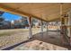 Covered patio with tiled flooring and string lights at 6259 S Fenton Ct, Littleton, CO 80123