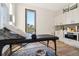 Versatile flex space with outdoor views, built-in cabinetry, sink, and potential for various uses at 1154 E Witherspoon Dr, Elizabeth, CO 80107