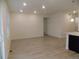 Open-concept living area with sleek floors, recessed lighting, and ample space for entertaining or relaxing at 1154 E Witherspoon Dr, Elizabeth, CO 80107