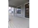 Covered porch with white columns and white railing offering an inviting outdoor space at 1154 E Witherspoon Dr, Elizabeth, CO 80107