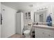 Bathroom with a vanity, tile floors, and a walk-in cabinet at 11296 Daisy Ct, Firestone, CO 80504