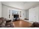 Bright living room featuring a large bay window and hardwood floors at 11296 Daisy Ct, Firestone, CO 80504