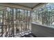 An outside balcony overlooks a serene view of a forest at 17865 Smugglers Rd, Monument, CO 80132