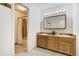 Bathroom featuring double sinks and a shower-tub combination at 17865 Smugglers Rd, Monument, CO 80132