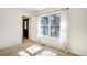 A bedroom with a black door leading to the outdoor porch at 17865 Smugglers Rd, Monument, CO 80132