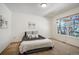 A simple and comfortable bedroom with neutral colors at 17865 Smugglers Rd, Monument, CO 80132