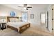 This bedroom features a unique window and a ceiling fan with light at 17865 Smugglers Rd, Monument, CO 80132