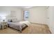 This bedroom features a plush throw and bright window at 17865 Smugglers Rd, Monument, CO 80132