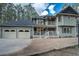 Charming two-story home features a welcoming front porch and a two-car garage, with lovely landscaping at 17865 Smugglers Rd, Monument, CO 80132