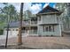 Lovely two-story home with a charming porch, two car garage, and beautiful architectural design at 17865 Smugglers Rd, Monument, CO 80132