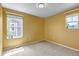Bedroom featuring natural light, plush carpet, and bright window views at 3429 Hardin St, Castle Rock, CO 80109