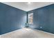 This is a bedroom with a single window and a plant in the corner at 3429 Hardin St, Castle Rock, CO 80109