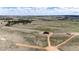 Expansive aerial view of property showcasing land and neighboring open space at 37094 Still Rock Pt, Elizabeth, CO 80107