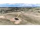 Expansive aerial view of home on rural acreage, showcasing neighboring properties at 37094 Still Rock Pt, Elizabeth, CO 80107