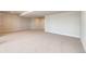 Unfinished basement with modern ceiling lights, and a neutral colored floor at 37094 Still Rock Pt, Elizabeth, CO 80107