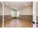 Spacious bedroom featuring natural lighting, neutral wall color and hardwood flooring at 37094 Still Rock Pt, Elizabeth, CO 80107