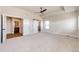 Expansive main bedroom with plush carpet, abundant natural light, and ensuite bath at 37094 Still Rock Pt, Elizabeth, CO 80107