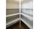 Walk-in pantry providing ample storage with shelving at 37094 Still Rock Pt, Elizabeth, CO 80107