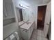 Bathroom featuring a vanity, mirror, and tiled floor at 3735 S Lewiston St, Aurora, CO 80013