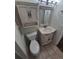 Bathroom featuring tile floors, single sink vanity and storage at 3735 S Lewiston St, Aurora, CO 80013