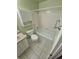 Full bathroom with tile floors and a shower-tub combination at 3735 S Lewiston St, Aurora, CO 80013