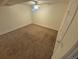 Carpeted bedroom with ceiling fan and natural light at 3735 S Lewiston St, Aurora, CO 80013