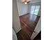 Bright bedroom with wood floors and sliding glass doors to the backyard at 3735 S Lewiston St, Aurora, CO 80013