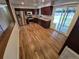 Updated kitchen featuring granite counters, stainless steel appliances, and wood laminate floors at 3735 S Lewiston St, Aurora, CO 80013