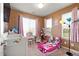 Charming bedroom featuring a unicorn theme and cute decor, perfect for a  at 12770 Jasmine Ct, Thornton, CO 80602