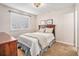 Cozy bedroom with window and a comfortable bed at 3183 W 114Th Loop, Westminster, CO 80031