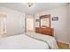 Bedroom with bed, dresser, and plenty of natural light at 3183 W 114Th Loop, Westminster, CO 80031