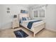 Comfortable bedroom featuring a bed, nightstand, window with blinds, and a neutral carpet at 3183 W 114Th Loop, Westminster, CO 80031