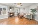 Inviting living room with hardwood floors, fireplace, and neutral decor at 3183 W 114Th Loop, Westminster, CO 80031