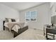 Cozy bedroom with neutral decor and a window seat at 9275 Merino Ct # A, Littleton, CO 80125