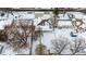 Aerial view of house and neighborhood in winter at 1770 Akron St, Aurora, CO 80010