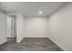 Bright and airy basement room with vinyl flooring at 1770 Akron St, Aurora, CO 80010